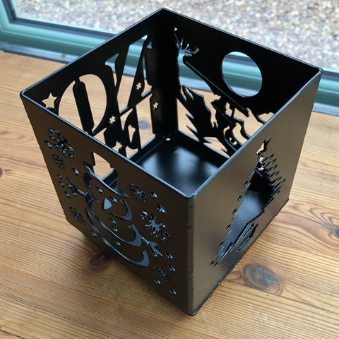 Black Steel Christmas Candle Holder featuring a Snowman, Noel, Christmas Tree and Santa