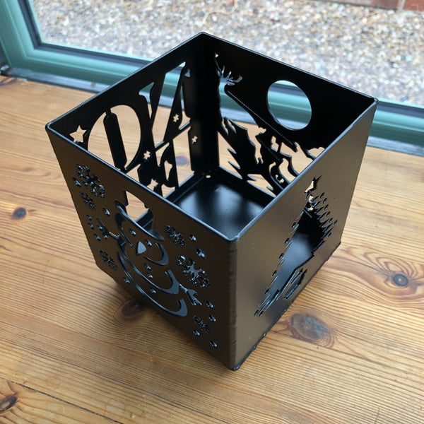 Black Steel Christmas Candle Holder featuring a Snowman, Noel, Christmas Tree and Santa