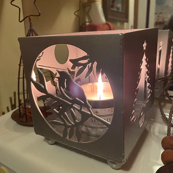 Silver Steel Christmas Candle Holder featuring a Bauble, Christmas Tree, a Robin and a Santa