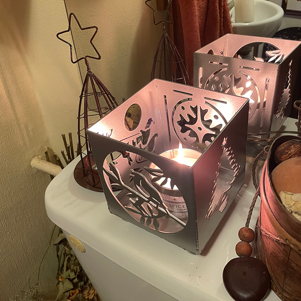 Silver Steel Christmas Candle Holder featuring a Bauble, Christmas Tree, a Robin and a Santa