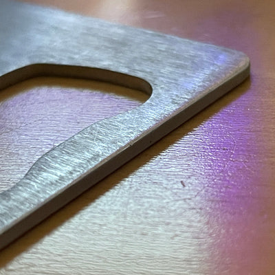 Outlaw Triathlon Bottle Opener