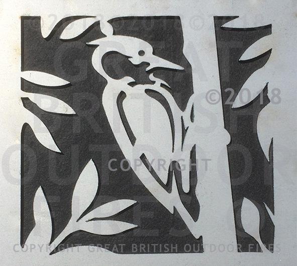 "This design features a woodpecker at the centre perched in a tree with branches and leaves around the perimeter."